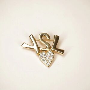 Yves Saint Laurent Gold Brooch with Silver Heart